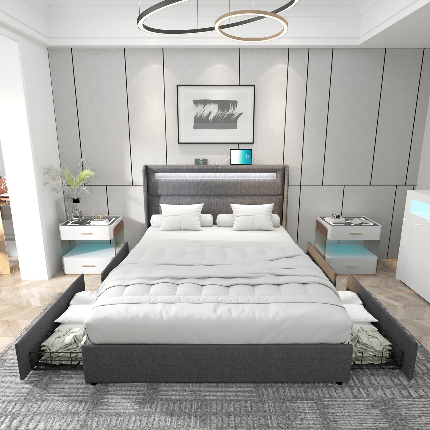 The albion queen bedframe in its light grey colored variant, showcased in a clean modern bedroom, the two front storage drawers are open showing folded bed linen stored inside. 